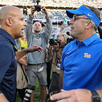 Sep 9, 2017; University Park, PA, USA; Penn State Nittany Lions head coach James Franklin (left) and Pittsburgh Panthers head coach Pat Narduzzi (right) congratulate each other at mid field following the competition of the game at Beaver Stadium. Penn State defeated Pitt 33-14. Mandatory Credit: Matthew O'Haren-Imagn Images