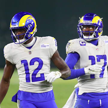 Jan 16, 2021; Green Bay, Wisconsin, USA; Los Angeles Rams wide receiver Van Jefferson (12) and Robert Woods (17) against the Green Bay Packers during the NFC Divisional Round at Lambeau Field. Mandatory Credit: Mark J. Rebilas-Imagn Images