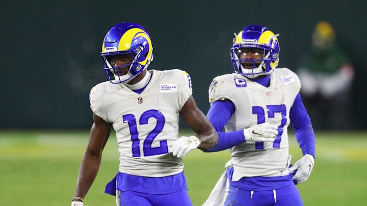 Jan 16, 2021; Green Bay, Wisconsin, USA; Los Angeles Rams wide receiver Van Jefferson (12) and Robert Woods (17) against the Green Bay Packers during the NFC Divisional Round at Lambeau Field. Mandatory Credit: Mark J. Rebilas-Imagn Images