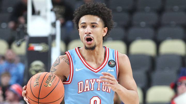 Mar 14, 2026; Pittsburgh, PA, USA;  Dayton Flyers guard Javon Bennett (0) brings the ball up court against the Saint Louis Billikens during the first half in an Atlantic 10 Conference Tournament Semifinal game at PPG Paints Arena. Mandatory Credit: Charles LeClaire-Imagn Images