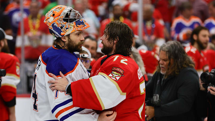 Edmonton Oilers goaltender Stuart Skinner and Florida Panthers goaltender Sergei Bobrovsky talk after Game 7.