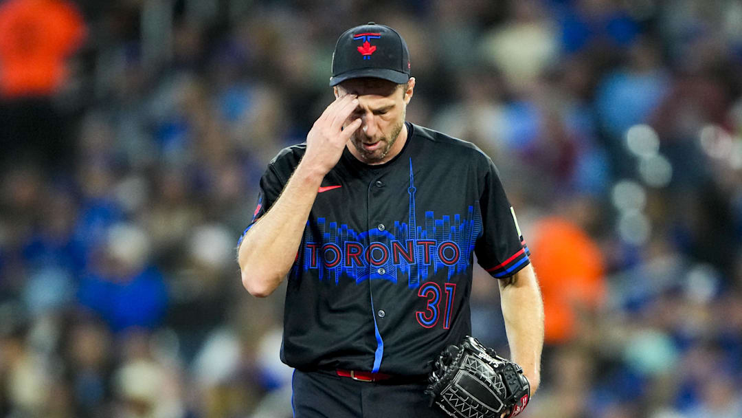 Apr 24, 2026; Toronto, Ontario, CAN; Toronto Blue Jays pitcher Max Scherzer (31) touches his head during the first inning against the Cleveland Guardians at Rogers Centre. Mandatory Credit: Kevin Sousa-Imagn Images