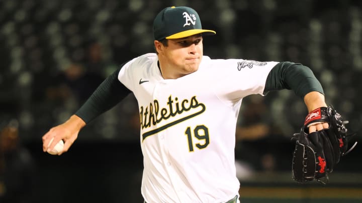 Jun 19, 2024; Oakland, California, USA; Oakland Athletics relief pitcher Mason Miller (19) pitches the ball against the Kansas City Royals during the ninth inning at Oakland-Alameda County Coliseum.