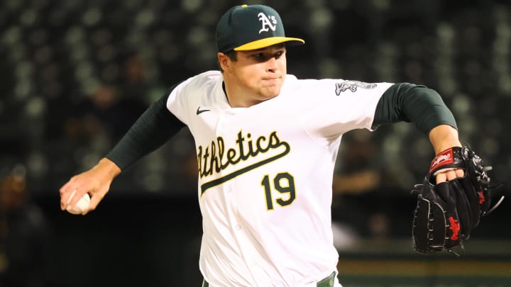 Jun 19, 2024; Oakland, California, USA; Oakland Athletics relief pitcher Mason Miller (19) pitches the ball against the Kansas City Royals during the ninth inning at Oakland-Alameda County Coliseum.