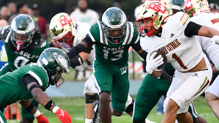 Bergen Catholic's Dante Kain runs the ball during the football game between Bergen Catholic and Winslow played at Winslow Township High School on Friday, September 12, 2025.