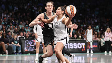 Oct 1, 2024; Brooklyn, New York, USA; Las Vegas Aces guard Kelsey Plum (10) and New York Liberty forward Breanna Stewart (30) during game two of the 2024 WNBA Semi-finals at Barclays Center. Mandatory Credit: Wendell Cruz-Imagn Images