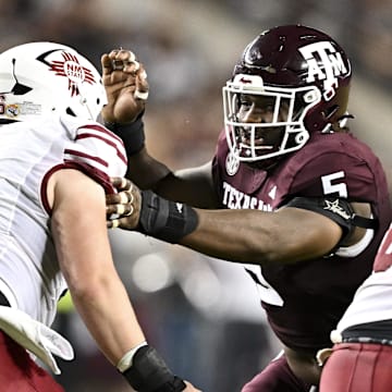 Texas A&M Aggies defensive lineman Shemar Turner (5) defends in coverage against the New Mexico State Aggies during the first half at Kyle Field. 