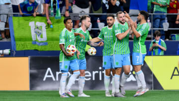 Jul 6, 2024; Seattle, Washington, USA; Seattle Sounders FCs celebrate after a goal by midfielder Albert Rusnak (11) in the second half against the New England Revolution at Lumen Field. Mandatory Credit: Steven Bisig-USA TODAY Sports