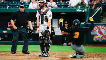 Mizzou's Danny Corona slides safely into home as the Tigers took on the Missouri State Beats at Hammons Field on Tuesday, April 16, 2024