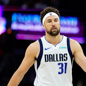 Apr 16, 2025; Sacramento, California, USA; Dallas Mavericks guard Klay Thompson (31) celebrates with teammates after scoring a basket during the second quarter against the Sacramento Kings at Golden 1 Center. Mandatory Credit: Sergio Estrada-Imagn Images