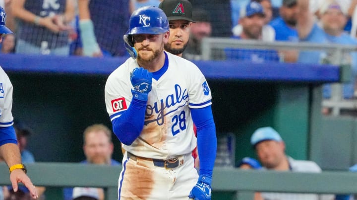 Jul 24, 2024; Kansas City, Missouri, USA; Kansas City Royals center fielder Kyle Isbel (28) celebrates after hitting a RBI triple against the Arizona Diamondbacks in the fourth inning at Kauffman Stadium. Mandatory Credit: Denny Medley-USA TODAY Sports