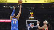 Nov 2, 2025; Oklahoma City, Oklahoma, USA;Oklahoma City Thunder guard Ajay Mitchell (25) shoots a three point basket against the New Orleans Pelicans  during the second quarter at Paycom Center. Mandatory Credit: Alonzo Adams-Imagn Images
