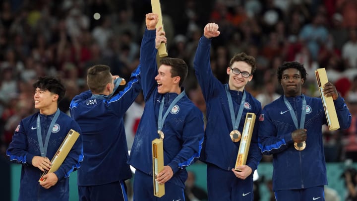 Jul 29, 2024; Paris, France; Team USA react after winning their bronze medals in the men’s team final during the Paris 2024 Olympic Summer Games at Bercy Arena. 