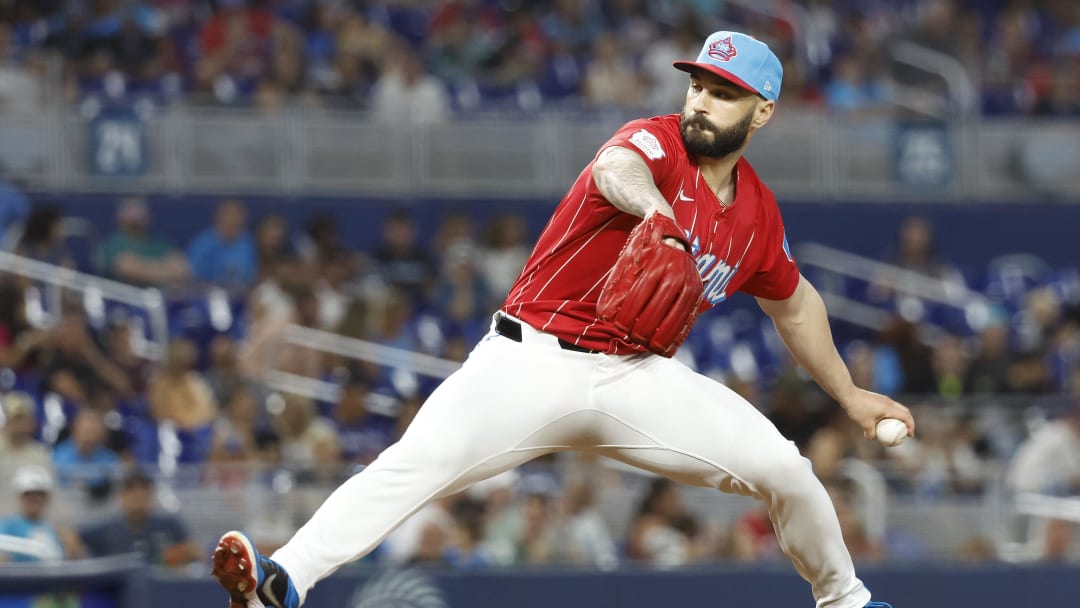 Jul 6, 2024; Miami, Florida, USA; Miami Marlins relief pitcher Tanner Scott (66) pitches against the Chicago White Sox during the ninth inning at loanDepot Park.