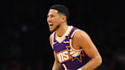 Mar 24, 2025; Phoenix, Arizona, USA; Phoenix Suns guard Devin Booker (1) reacts against the Milwaukee Bucks at Footprint Center. Mandatory Credit: Mark J. Rebilas-Imagn Images