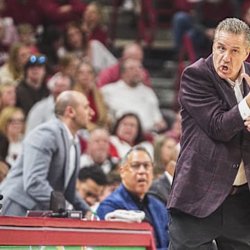 Arkansas Razorbacks coach John Calipari on the sidelines against the Missouri Tigers at Bud Walton Arena in Fayetteville, Ark.