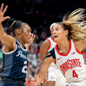 Former Penn State guard Tay Valladay guards Ohio State's Jacy Sheldon during a Big Ten women's basketball game. 