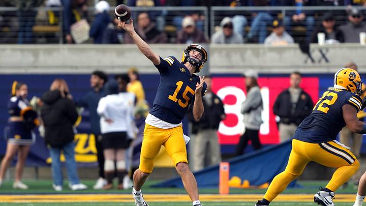 Nov 23, 2024; Berkeley, California, USA; California Golden Bears quarterback Fernando Mendoza (15) throws a pass against the Stanford Cardinal during the fourth quarter at California Memorial Stadium. Mandatory Credit: Darren Yamashita-Imagn Images
