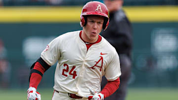 Charles Davalan runs the bases for the Arkansas Razorbacks.