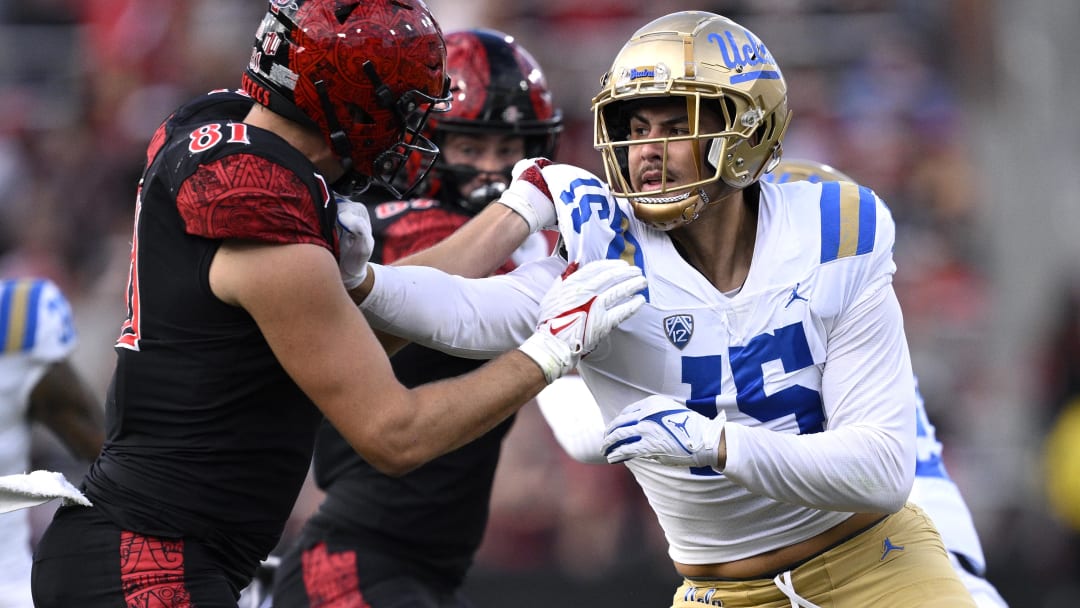 Sep 9, 2023; San Diego, California, USA; UCLA Bruins defensive lineman Laiatu Latu (15) battles