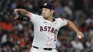 Sep 19, 2024; Houston, Texas, USA;  Houston Astros starting pitcher Yusei Kikuchi (16) pitches against the Los Angeles Angels in the second inning at Minute Maid Park.