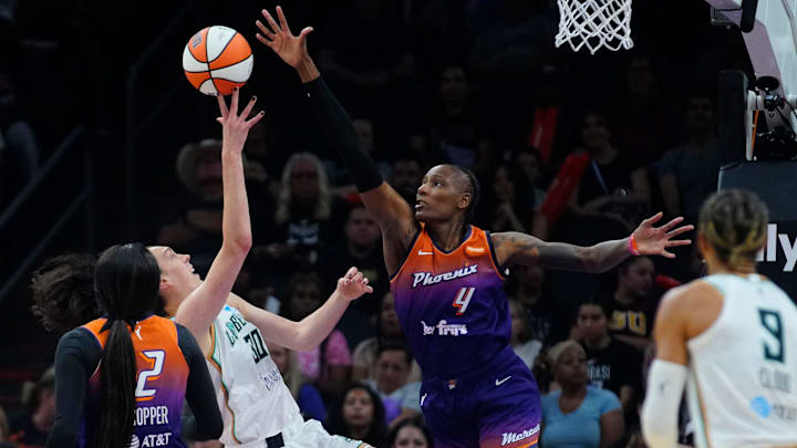 Mercury center Natasha Mack (4) contests a shot from Liberty forward Breanna Stewart (30) during a game at PHX Arena in Phoenix, on June 27, 2025.