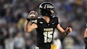 Purdue Boilermakers quarterback Ryan Browne (15) throws a pass