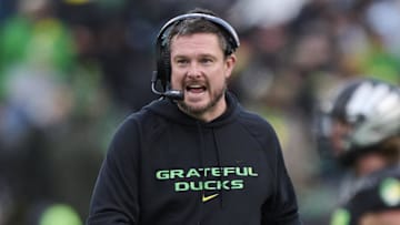 Oct 25, 2025; Eugene, Oregon, USA; Oregon Ducks head coach Dan Lanning instructs players during the first half against the Wisconsin Badgers at Autzen Stadium. Mandatory Credit: Troy Wayrynen-Imagn Images