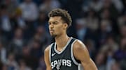 Dec 29, 2024; Minneapolis, Minnesota, USA; San Antonio Spurs center Victor Wembanyama (1) reacts after making a shot against the Minnesota Timberwolves in the first half at Target Center. Mandatory Credit: Jesse Johnson-Imagn Images