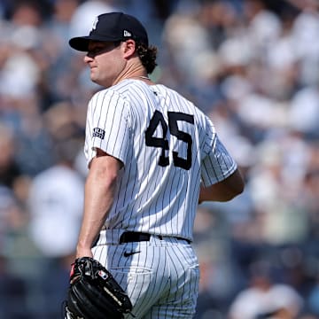 Sep 14, 2024; Bronx, New York, USA; New York Yankees starting pitcher Gerrit Cole (45) reacts during the fifth inning against the Boston Red Sox at Yankee Stadium. Mandatory Credit: Brad Penner-Imagn Images