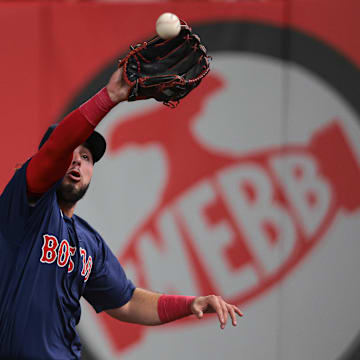 Sep 13, 2024; Bronx, New York, USA; Boston Red Sox right fielder Wilyer Abreu (52) makes a catch for an out on a ball hit by New York Yankees shortstop Anthony Volpe (not pictured) during the fourth inning at Yankee Stadium. Mandatory Credit: Vincent Carchietta-Imagn Images