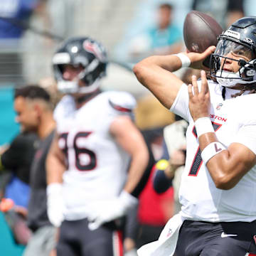 Sep 21, 2025; Jacksonville, Florida, USA; Houston Texans quarterback C.J. Stroud (7) warms up before the game against the Jacksonville Jaguars at EverBank Stadium. Mandatory Credit: Morgan Tencza-Imagn Images