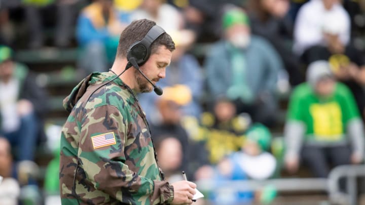 Oregon head coach Dan Lanning takes notes during the Oregon Ducks’ Spring Game Saturday, April 27. 2024 at Autzen Stadium in Eugene, Ore.