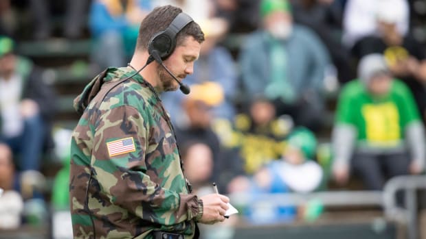 Oregon head coach Dan Lanning takes notes during the Oregon Ducks’ Spring Game Saturday, April 27. 2024 at Autzen Stadium in 