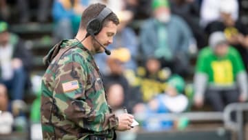 Oregon head coach Dan Lanning takes notes during the Oregon Ducks’ Spring Game Saturday, April 27. 2024 at Autzen Stadium in Eugene, Ore.