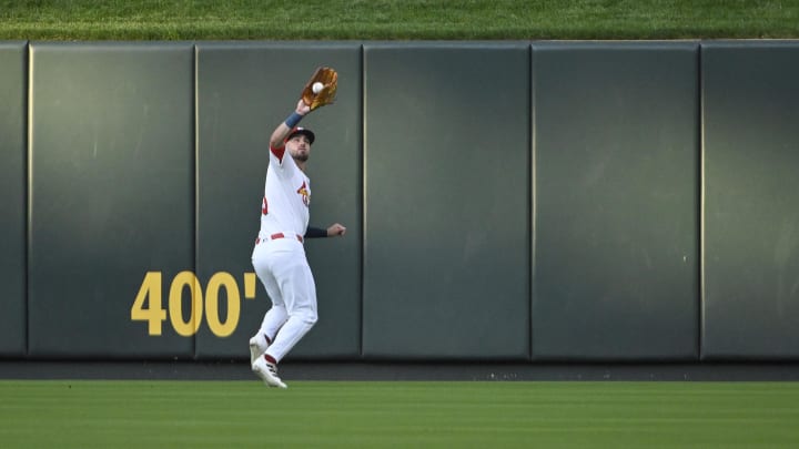 Jul 30, 2024; St. Louis, Missouri, USA;  St. Louis Cardinals center fielder Michael Siani (63) catches a fly ball against the Texas Rangers during the first inning at Busch Stadium. Mandatory Credit: Jeff Curry-USA TODAY Sports