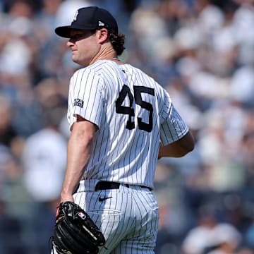 Sep 14, 2024; Bronx, New York, USA; New York Yankees starting pitcher Gerrit Cole (45) reacts during the fifth inning against the Boston Red Sox at Yankee Stadium. Mandatory Credit: Brad Penner-Imagn Images