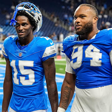 Detroit Lions cornerback Ennis Rakestraw Jr. (15), left, talks to defensive tackle Mekhi Wingo (94) was they walk off the field after 24-17 win over Pittsburgh Steelers at a preseason game at Ford Field in Detroit on Saturday, August 24, 2024.