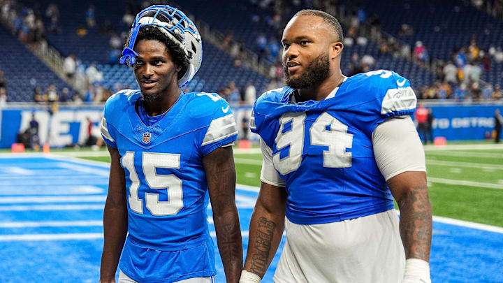 Detroit Lions cornerback Ennis Rakestraw Jr. (15), left, talks to defensive tackle Mekhi Wingo (94) was they walk off the field after 24-17 win over Pittsburgh Steelers at a preseason game at Ford Field in Detroit on Saturday, August 24, 2024.