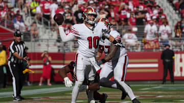 Sep 21, 2025; Santa Clara, California, USA; San Francisco 49ers quarterback Mac Jones (10) is sacked by Arizona Cardinals defensive end Calais Campbell (93) for a safety during the second half at Levi's Stadium. Mandatory Credit: Cary Edmondson-Imagn Images