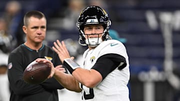 Jan 5, 2025; Indianapolis, Indiana, USA; Jacksonville Jaguars quarterback Mac Jones (10) throws a pass to warm up before the game against the Indianapolis Colts at Lucas Oil Stadium. Mandatory Credit: Marc Lebryk-Imagn Images
