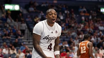 Texas A&M Aggies guard Wade Taylor IV (4) reacts during their second round game of the SEC Men's Basketball Tournament at Bridgestone Arena in Nashville, Tenn., Thursday, March 13, 2025.