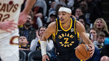 Jan 14, 2025; Indianapolis, Indiana, USA;  Indiana Pacers guard Andrew Nembhard (2) dribbles the ball in the second half against the Cleveland Cavaliers at Gainbridge Fieldhouse. Mandatory Credit: Trevor Ruszkowski-Imagn Images