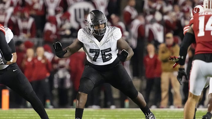 Nov 16, 2024; Madison, Wisconsin, USA; Oregon Ducks offensive linenam Josh Conerly Jr. (76) during the game against the Wisconsin Badgers at Camp Randall Stadium. Mandatory Credit: Jeff Hanisch-Imagn Images Nov 16, 2024; Madison, Wisconsin, USA; Oregon Ducks offensive linenam Josh Conerly Jr. (76) during the game against the Wisconsin Badgers at Camp Randall Stadium. Mandatory Credit: Jeff Hanisch-Imagn Images