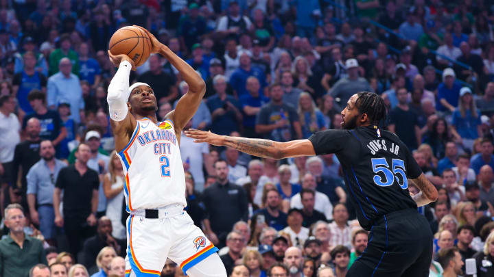 May 18, 2024; Dallas, Texas, USA; Oklahoma City Thunder guard Shai Gilgeous-Alexander (2) shoots over Dallas Mavericks forward Derrick Jones Jr. (55) during the first quarter in game six of the second round of the 2024 NBA playoffs at American Airlines Center. Mandatory Credit: Kevin Jairaj-USA TODAY Sports