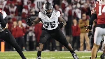 Nov 16, 2024; Madison, Wisconsin, USA;  Oregon Ducks offensive linenam Josh Conerly Jr. (76) during the game against the Wisconsin Badgers at Camp Randall Stadium. Mandatory Credit: Jeff Hanisch-Imagn Images