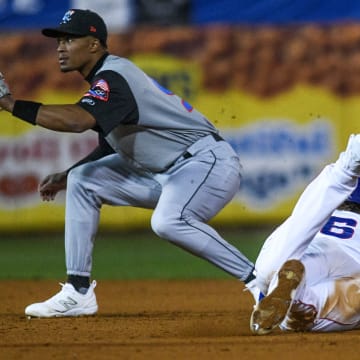 Tennessee Smokies' infielder James Triantos (6) slides into second base during the last opening day game at the Tennessee Smokies Stadium on Friday, April 5, 2024 in Kodak, Tenn.