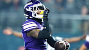 Northwestern Wildcats defensive back Jaheem Joseph (3) celebrates after making an interception against the Utah Utes during the first quarter at Allegiant Stadium. Mandatory Credit: Stephen R. Sylvanie-Imagn Images
