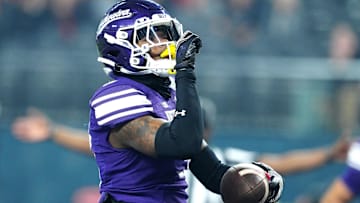 Northwestern Wildcats defensive back Jaheem Joseph (3) celebrates after making an interception against the Utah Utes during the first quarter at Allegiant Stadium. Mandatory Credit: Stephen R. Sylvanie-Imagn Images