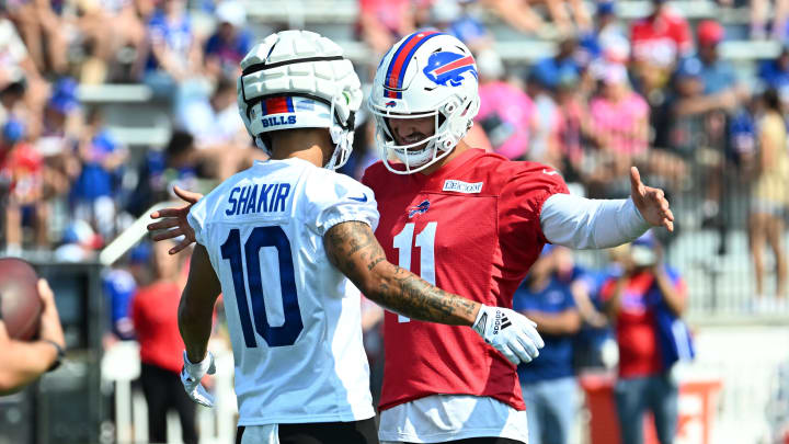 Jul 24, 2024; Rochester, NY, USA; Buffalo Bills quarterback Mitchell Trubisky (11) gives a hug to wide receiver Khalil Shakir (10) during training camp at St. John Fisher University. Mandatory Credit: Mark Konezny-USA TODAY Sports